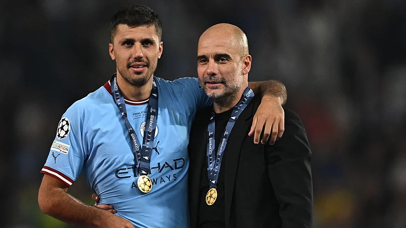 Pep Guardiola and Rodri