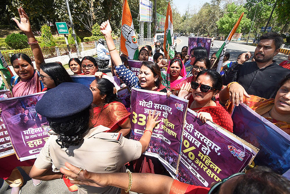 Mahila Congress supporters protest march