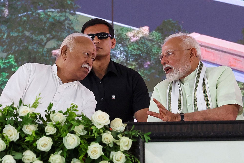| Photo: PMO via PTI : Modi with RSS Chief Mohan Bhagwat