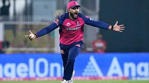 AP/Anupam Nath : Riyan Parag celebrates.