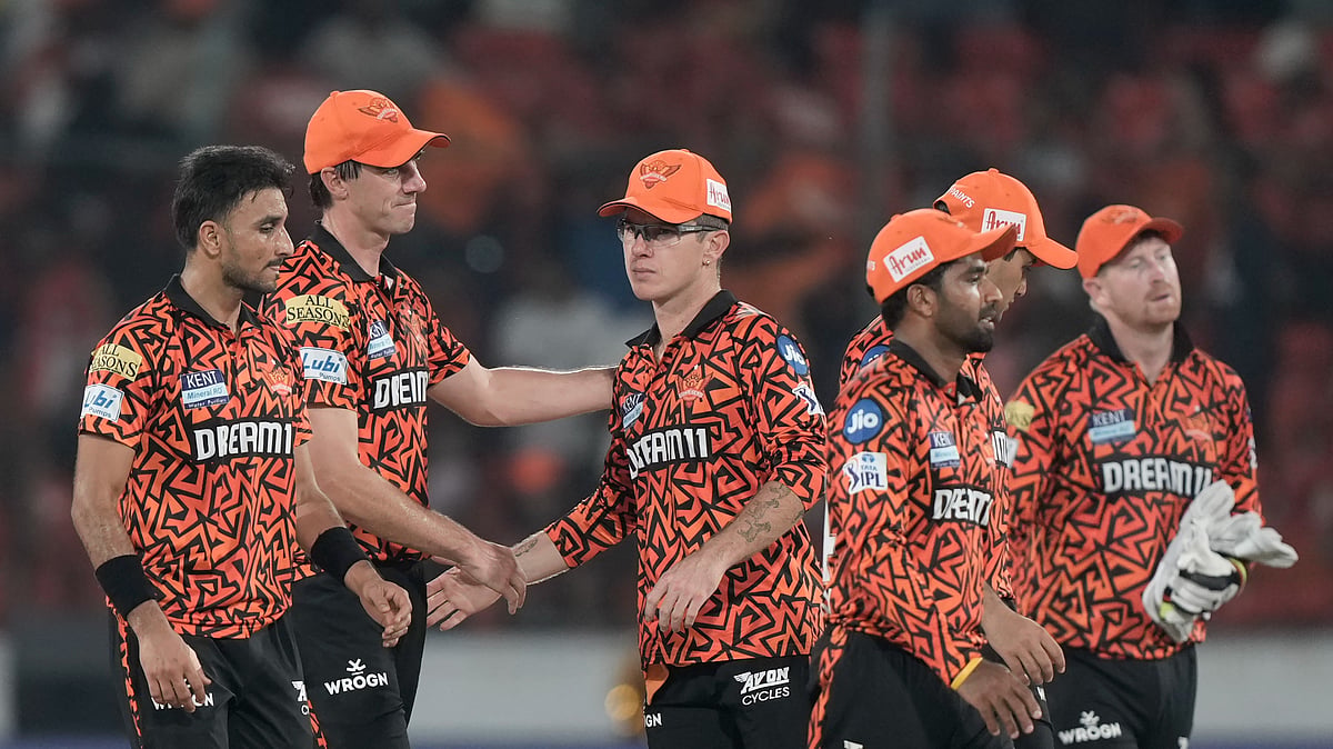 Sunrisers Hyderabads captain Pat Cummins and teammates celebrate. AP
