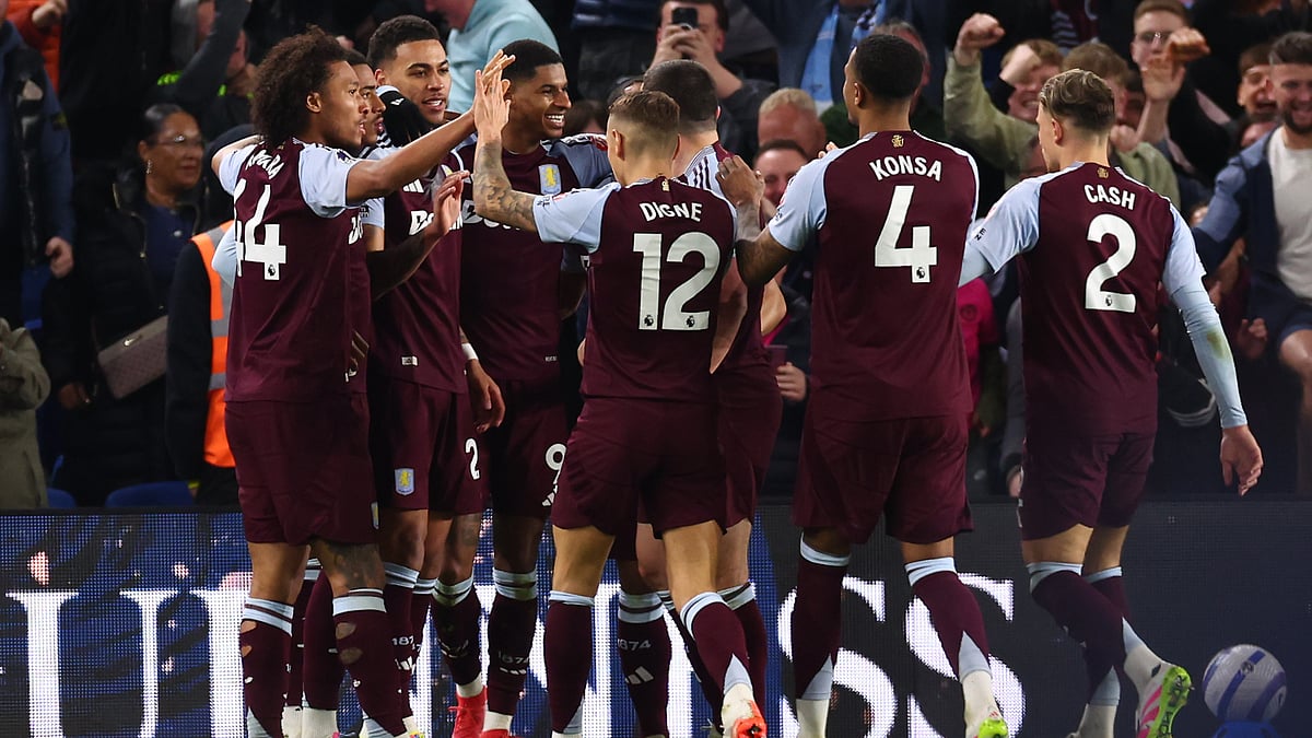 Aston Villa celebrate Marcus Rashford's goal. - null