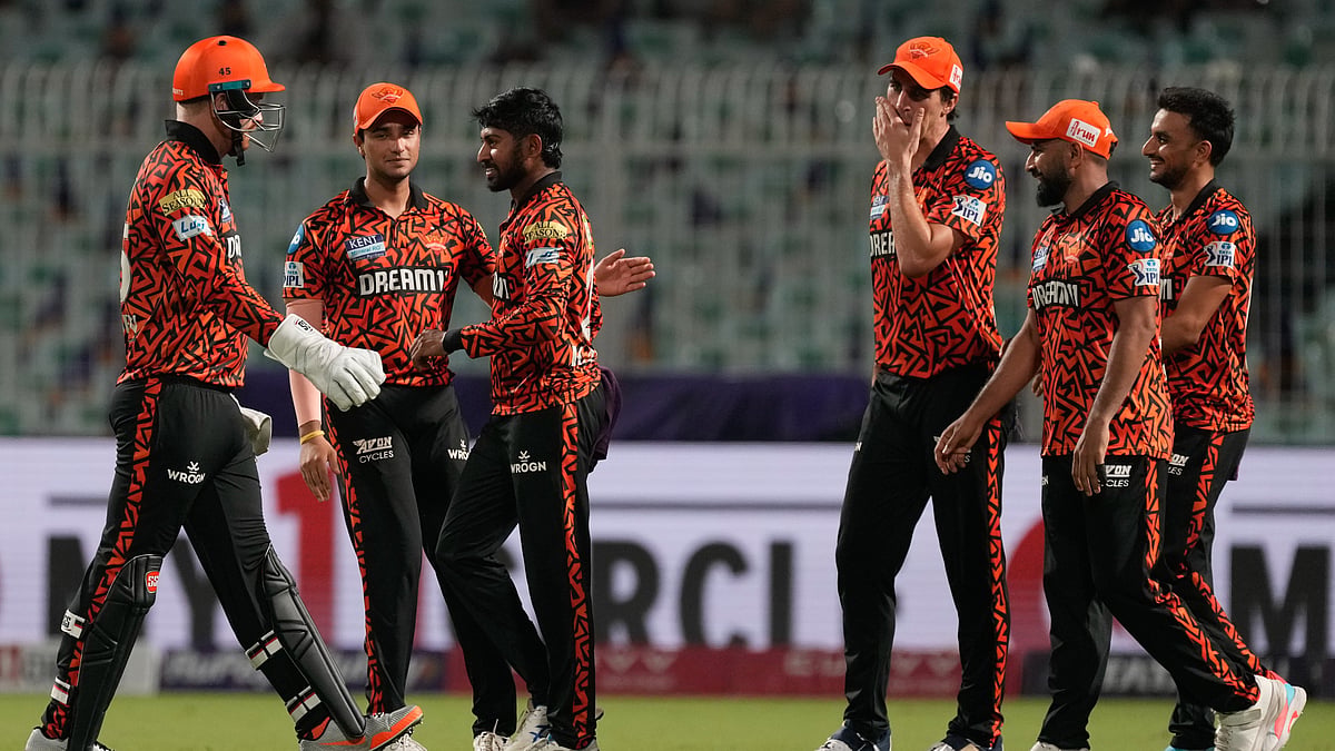 AP Photo/Bikas Das : Kamindu Mendis celebrates after dismissing Angkrish Raghuvanshi.