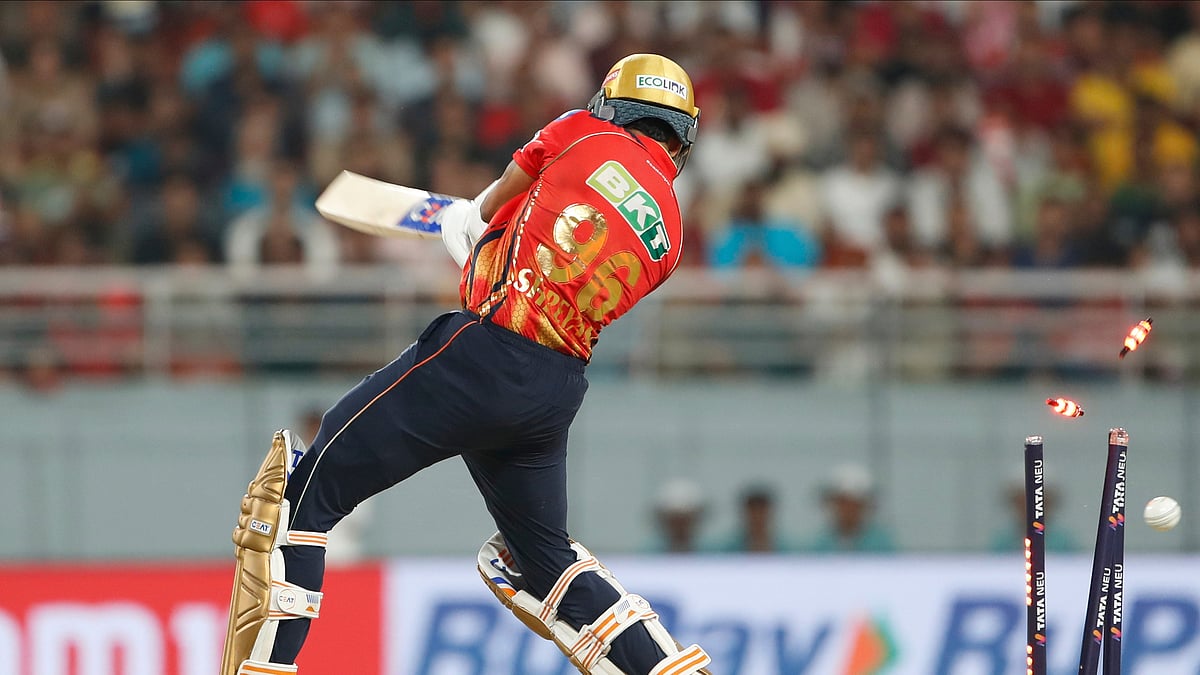 AP Photo/Surjeet Yadav : Punjab Kings' captain Shreyas Iyer is bowled out by Rajasthan Royals' Jofra Archer during the Indian Premier League cricket match between Punjab Kings and Rajasthan Royals at Maharaja Yadavindra Singh Cricket Stadium in Mohali.