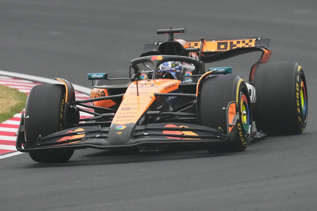 McLaren driver Oscar Piastri of Australia steers his car during the Japanese Formula One Grand Prix at the Suzuka Circuit in Suzuka, central Japan, Sunday, April 6, 2025. 


