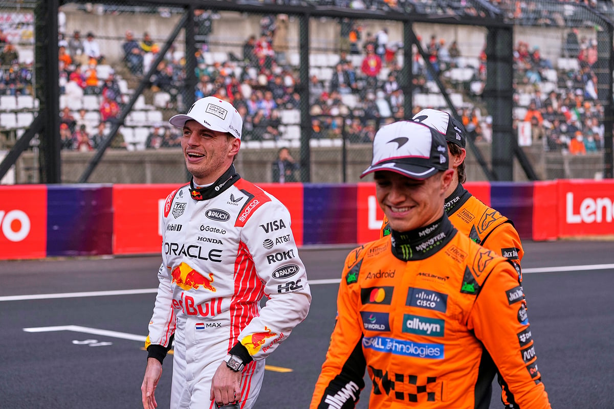 Red Bull driver Max Verstappen of the Netherlands celebrates after qualifying session for the Japanese Formula One Grand Prix at the Suzuka Circuit in Suzuka, central Japan, Saturday, April 5, 2025. 