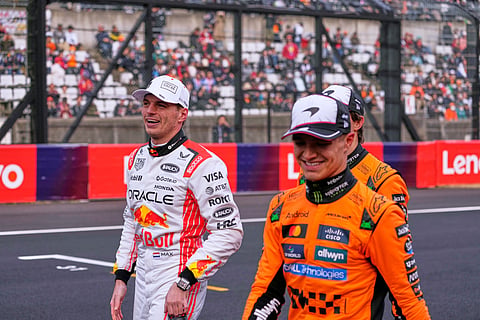 Red Bull driver Max Verstappen of the Netherlands celebrates after qualifying session for the Japanese Formula One Grand Prix at the Suzuka Circuit in Suzuka, central Japan, Saturday, April 5, 2025. 