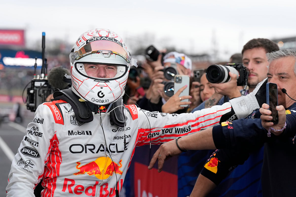  (AP Photo/Shuji Kajiyama, Pool)
 : Red Bull driver Max Verstappen of the Netherlands celebrates after winning the Japanese Formula One Grand Prix race at the Suzuka Circuit in Suzuka, central Japan, Sunday, April 6, 2025.

