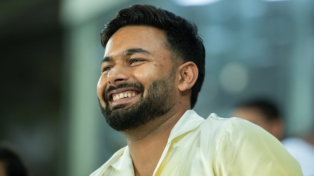FSDL/ISL : Rishabh Pant smiles while watching the Indian Super League clash between Mohun Bagan and Jamshedpur FC in Kolkata.
