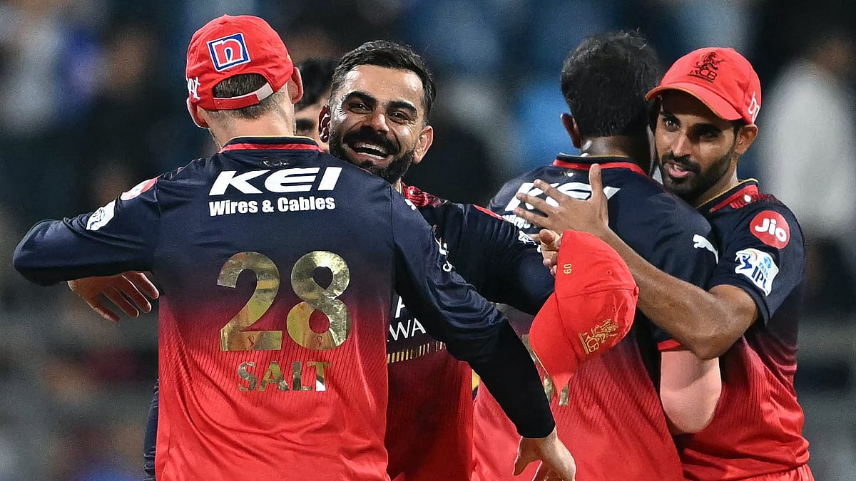 Royal Challengers Bengaluru celebrate their win over Mumbai Indians.