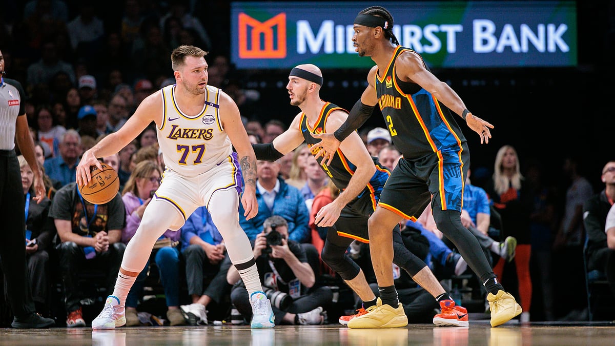Luka Doncic goes up against Shai Gilgeous-Alexander - null