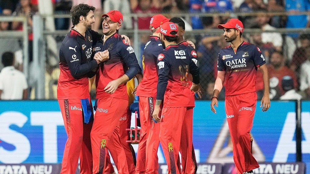 Royal Challengers Bengaluru players celebrates the dismissal of Mumbai Indians' Suryakumar Yadav during the Indian Premier League - (AP Photo)