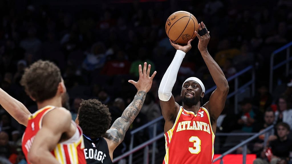 Atlanta Hawks guard Caris LeVert (3) attempts to shoot against Utah Jazz guard Keyonte George, second from right, during the first half of an NBA basketball game, Sunday, April 6, 2025, in Atlanta. - AP/Colin Hubbard