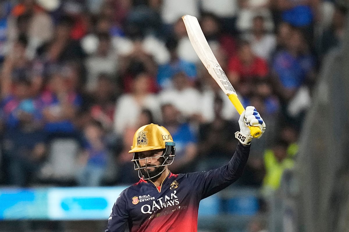  (AP Photo/Rafiq Maqbool)
 : Royal Challengers Bengaluru's captain Rajat Patidar celebrates after scoring fifty runs during the Indian Premier League cricket match between Mumbai Indians and Royal Challengers Bengaluru at Wankhede Stadium in Mumbai, India, Monday, April 7, 2025.

