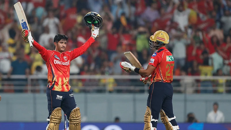 Punjab Kings Priyansh Arya, left, celebrates after scoring a century. AP