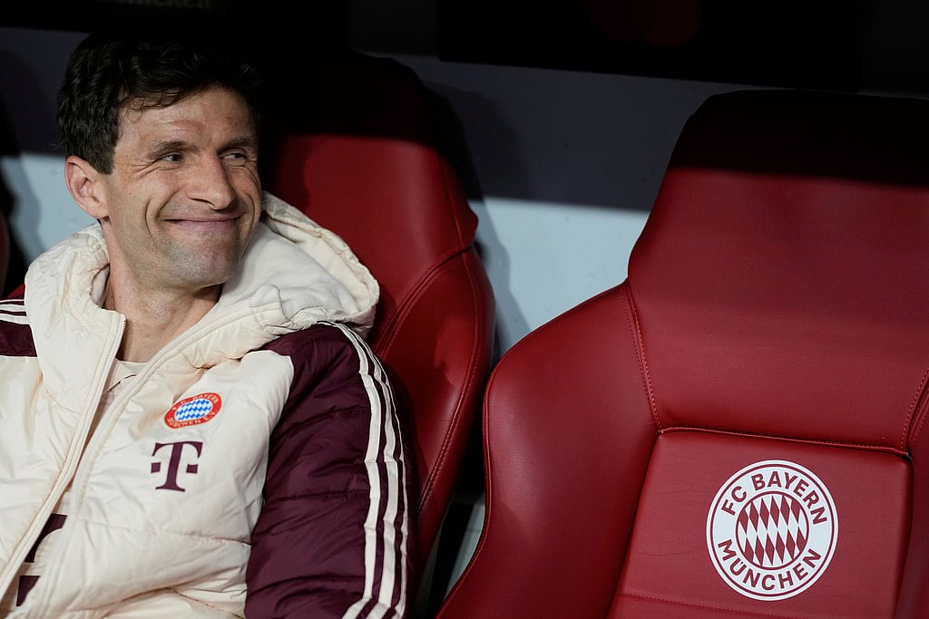 Bayern's Thomas Mueller looks out from the bench prior the Champions League quarterfinals match.