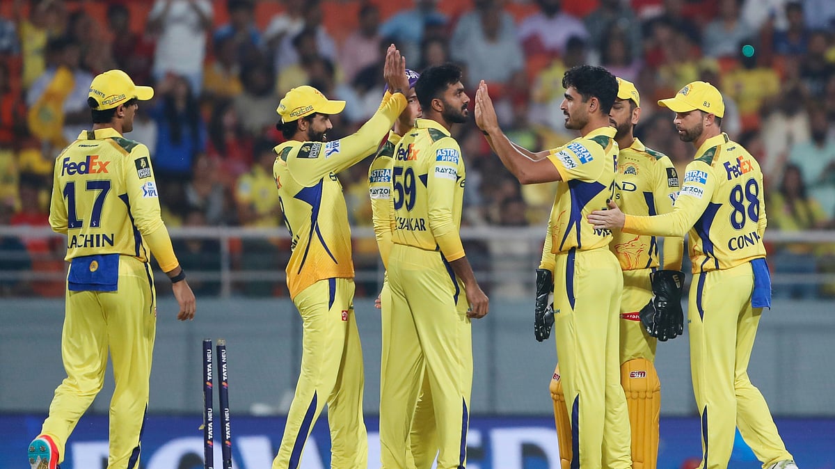 Chennai Super Kings Mukesh Choudhary, third right, celebrates. AP