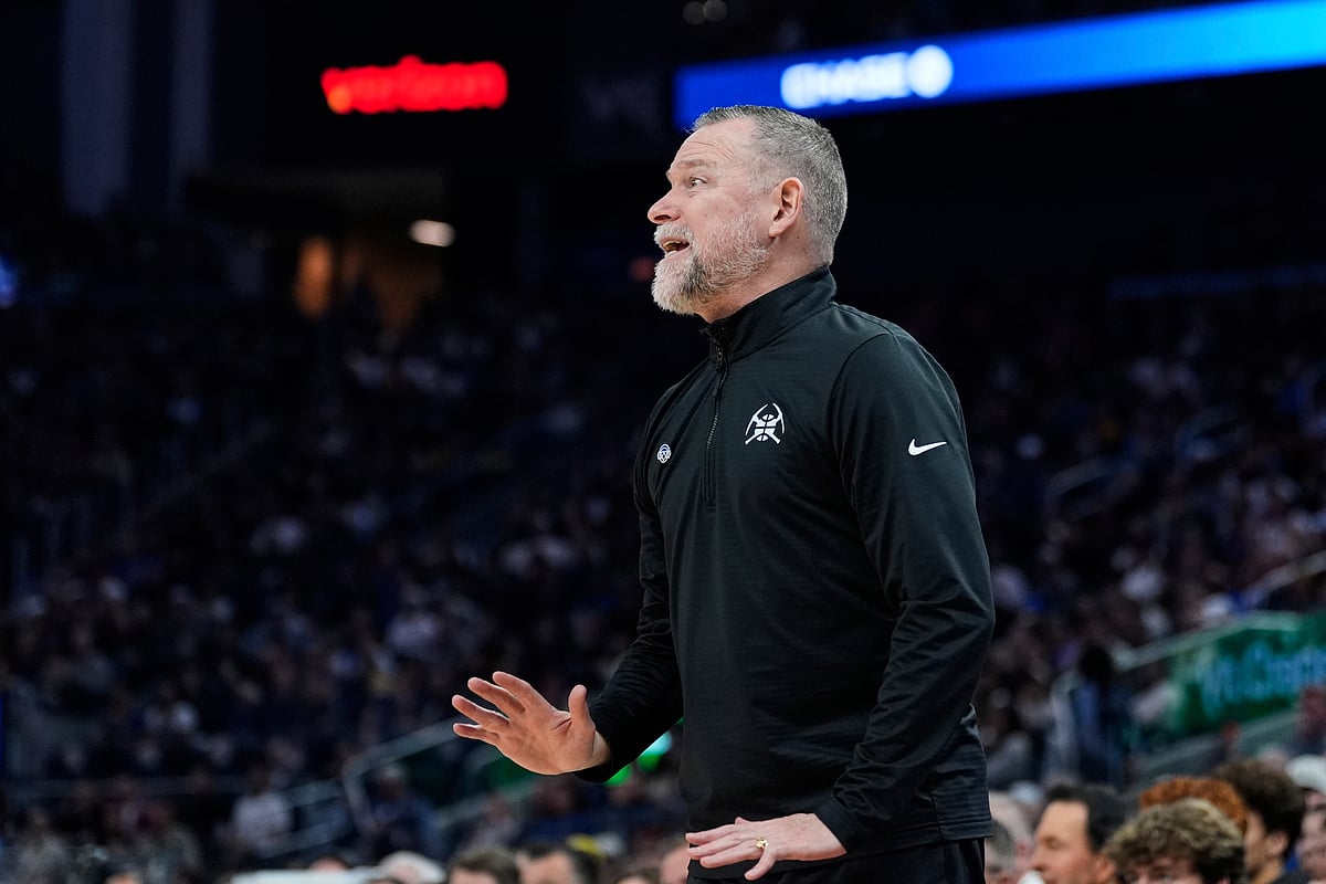 (AP Photo/Godofredo A. Vásquez) : Denver Nuggets head coach Michael Malone gestures during the first half of an NBA basketball game against the Golden State Warriors, Friday, April 4, 2025, in San Francisco.