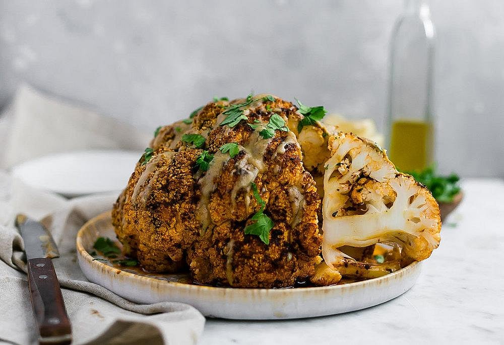 Roasted Cauliflower Head with Herbed Tahini Sauce