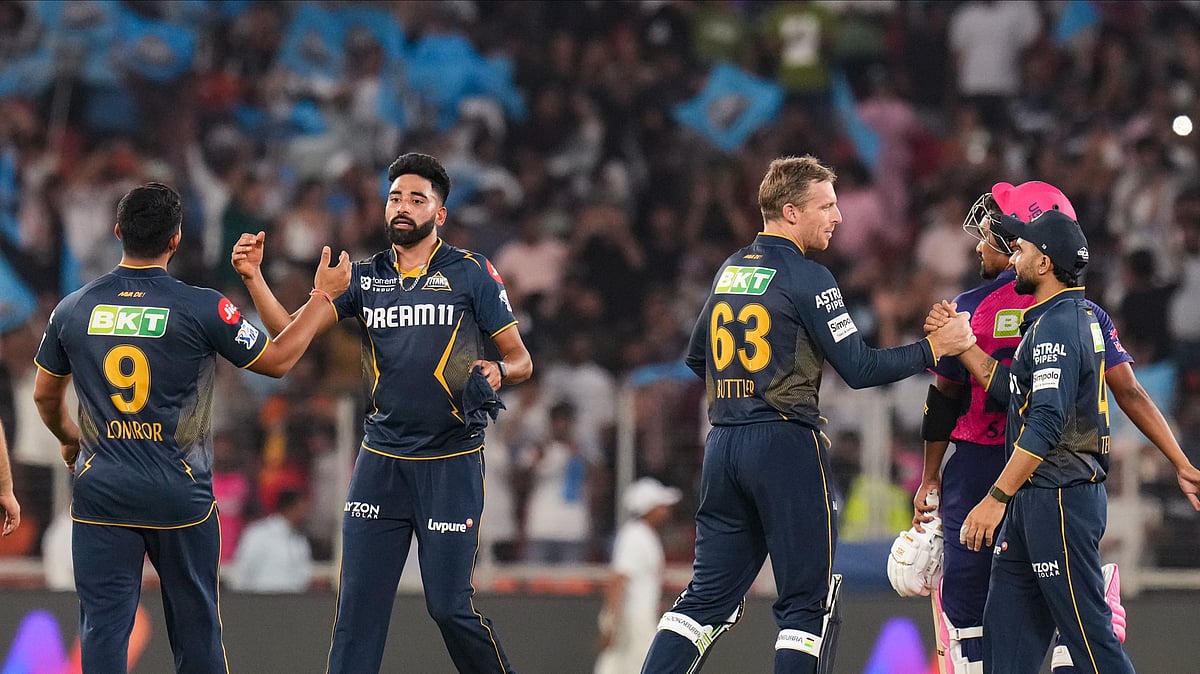 Gujarat Titans players celebrate after winning the IPL 2025. AP