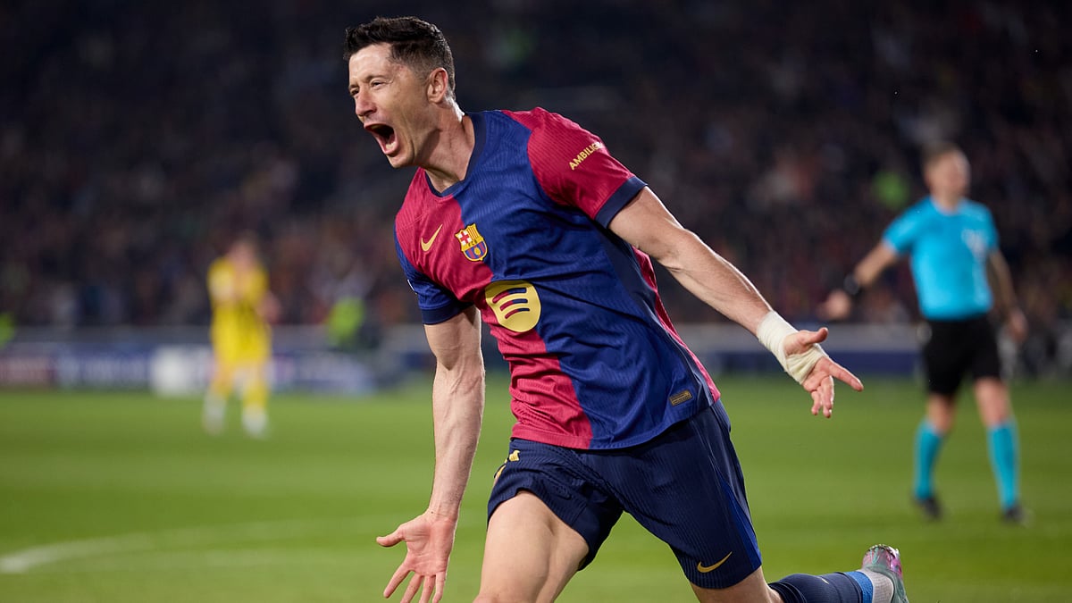 Robert Lewandowski celebrates after scoring against Borussia Dortmund