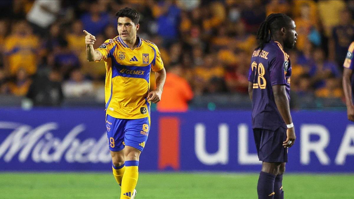 | AP Photo : Nicolas Ibanez of Tigres UANL, left, celebrates after scoring the opening goal against the LA Galaxy during their CONCACAF Champions Cup 2025 quarter-final second leg match at Universitario Stadium in Monterrey, Mexico on April 8, 2025.