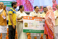 Ayushman Bharat Globally Number One In Hospital Admissions: BJP | Photo: PTI : Distribution of health cards under Ayushman Bharat scheme
