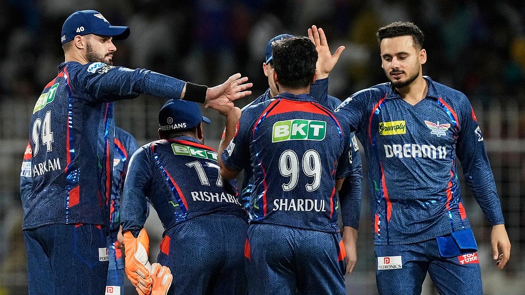 AP : Lucknow Super Giants' Shardul Thakur, centre, celebrates a Kolkata Knight Riders wicket with teammates.