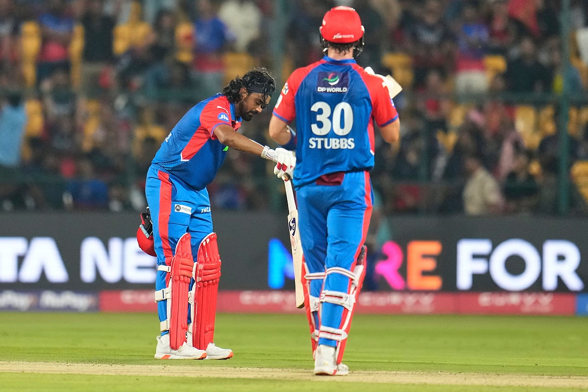  (AP Photo/Aijaz Rahi)
 : Delhi Capitals' KL Rahul, left, gestures to celebrate their win in the Indian Premier League cricket match against Royal Challengers Bengaluru at Chinnaswamy Stadium in Bengaluru, India, Thursday, April 10, 2025.

