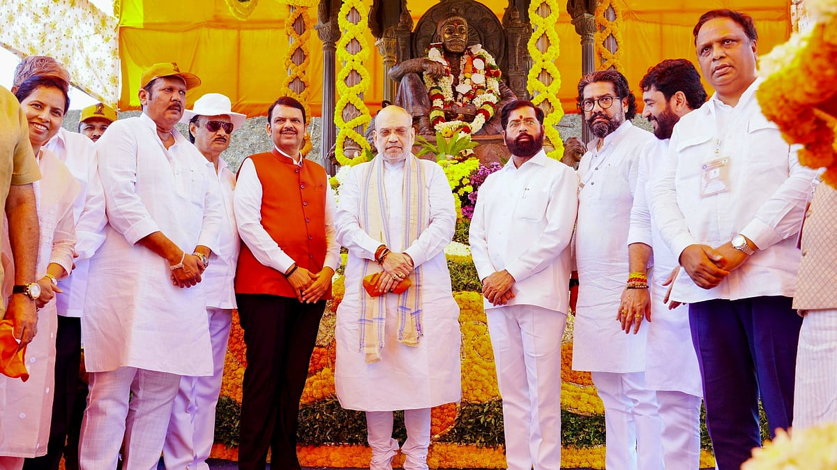 -PTI : Union Home Minister Amit Shah with Maharashtra CM Devendra Fadnavis and Dy CM Eknath Shinde and others after paying floral tribute to Chhatrapati Shivaji Maharaj at Raigad Fort.