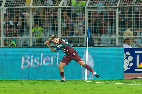 Mohun Bagan's Jamie Maclaren celebrates after scoring against Benglauru FC.