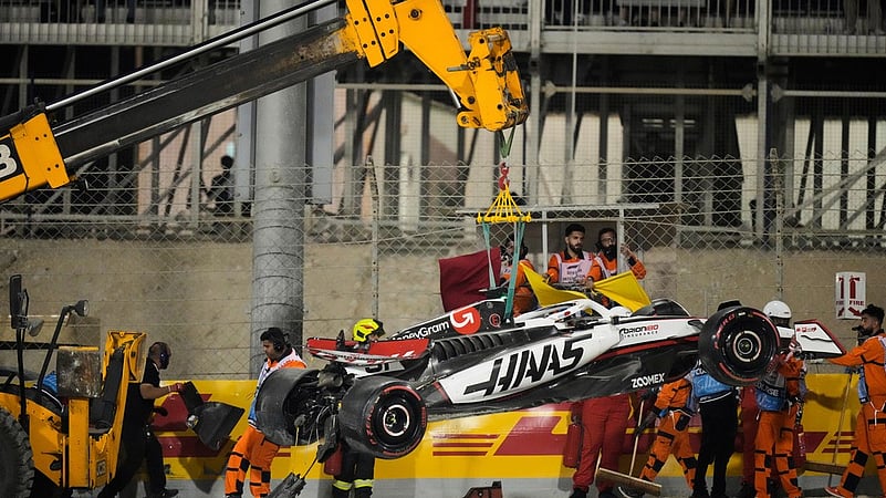 The Haas car of driver Esteban Ocon is removed Bahrain Grand Prix F1