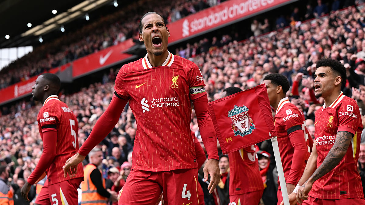 Virgil van Dijk celebrates his late heroics on Sunday - null