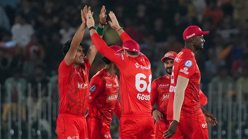 Islamabad United celebrate a Peshawar Zalmi wicket during the Pakistan Super League