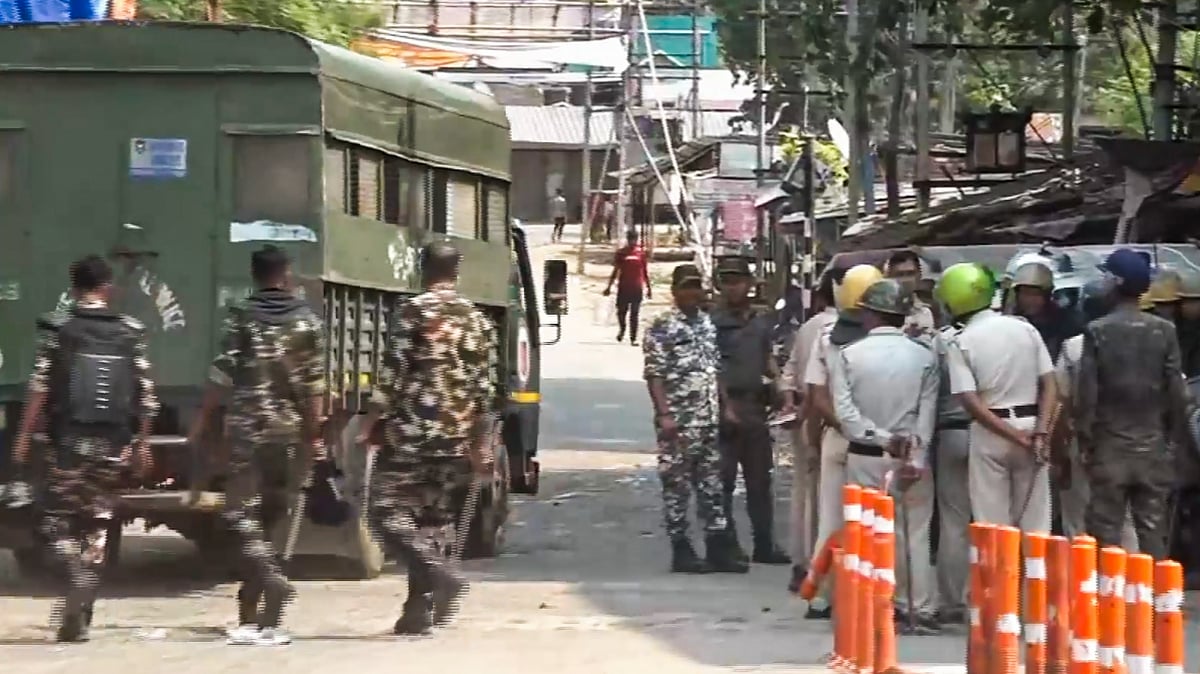 -PTI : Security forces personnel guard in a violence-hit area, in Murshidabad district, Sunday, April 13, 2025. Violence erupted in the area following protests over Waqf Act.