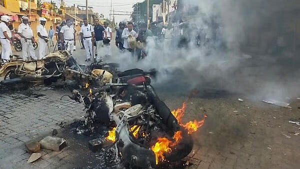 Vehicles torched during anti-Waqf protests in West Bengal - PTI