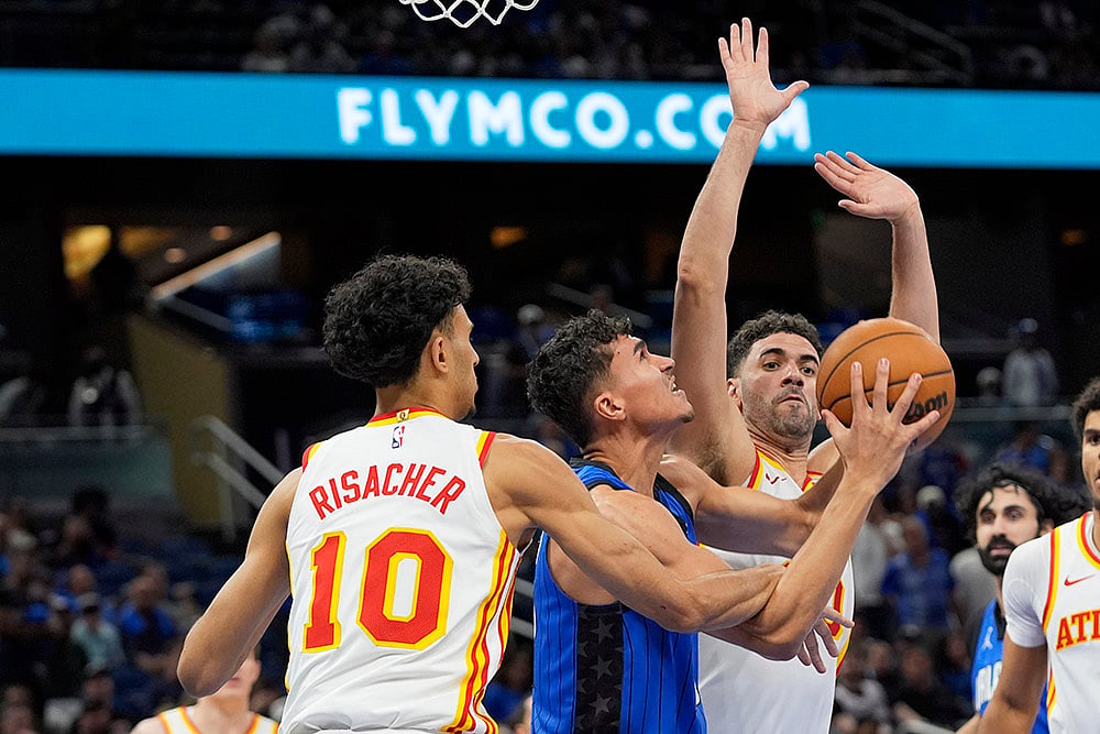 | Photo: AP/John Raoux : NBA: Atlanta Hawks vs Orlando Magic
