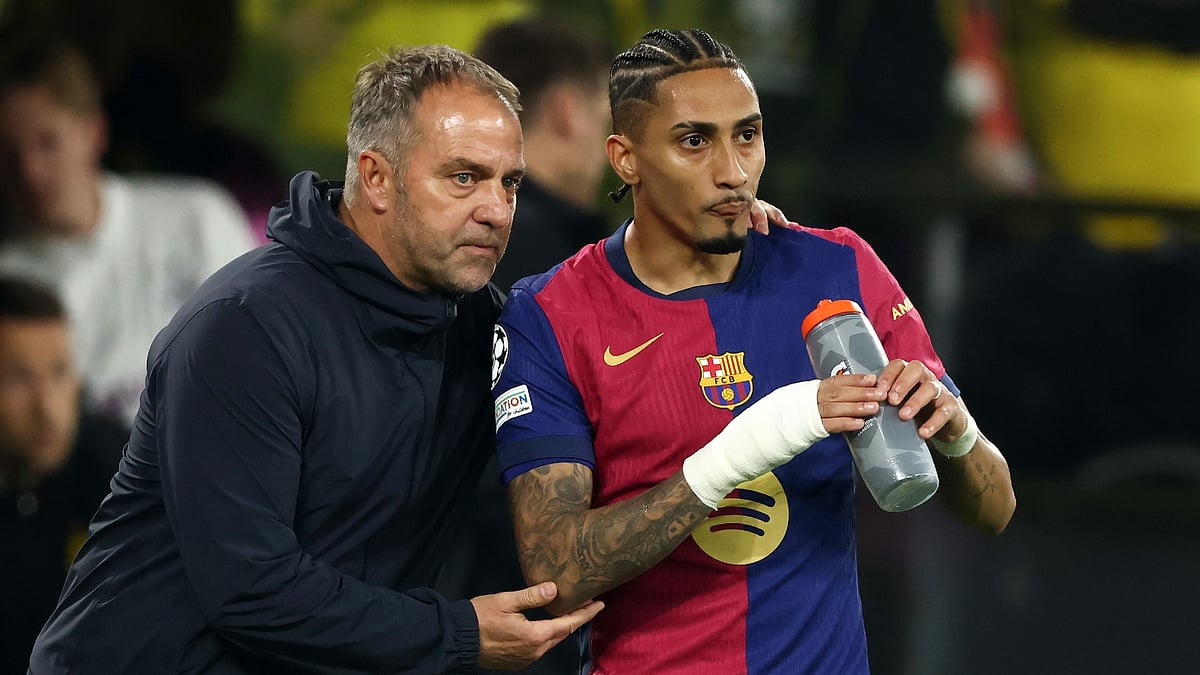 Barca boss Hansi Flick and star player Raphinha