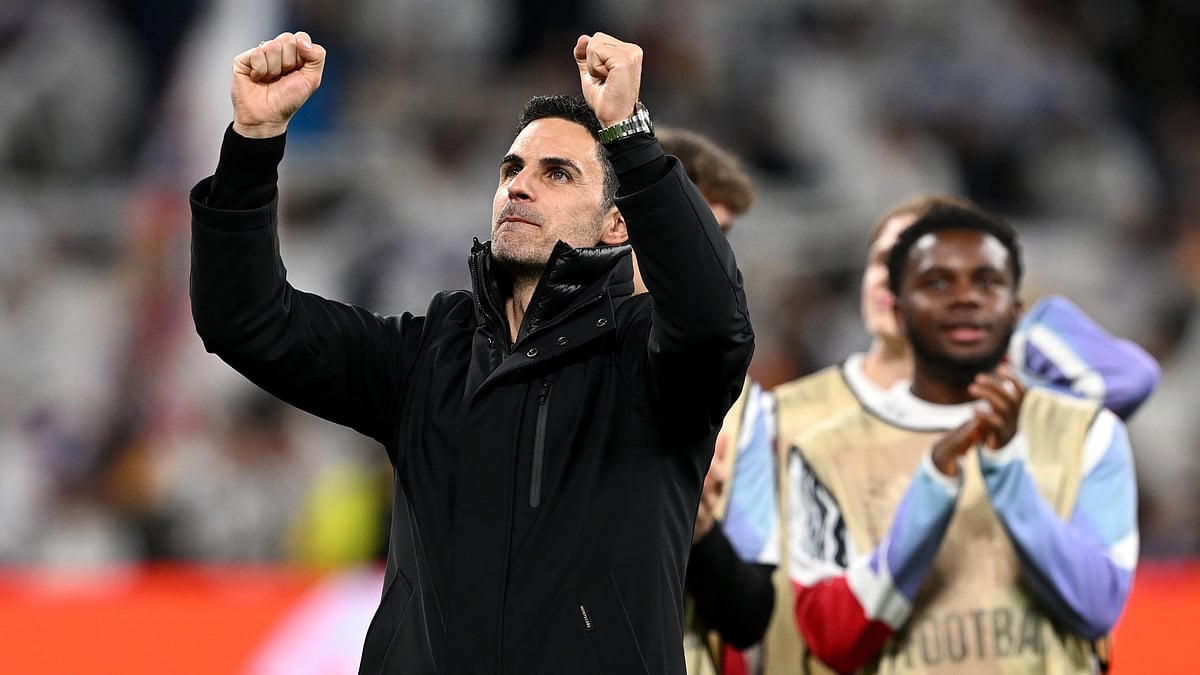 Mikel Arteta celebrates Arsenal's victory at the Santiago Bernabeu