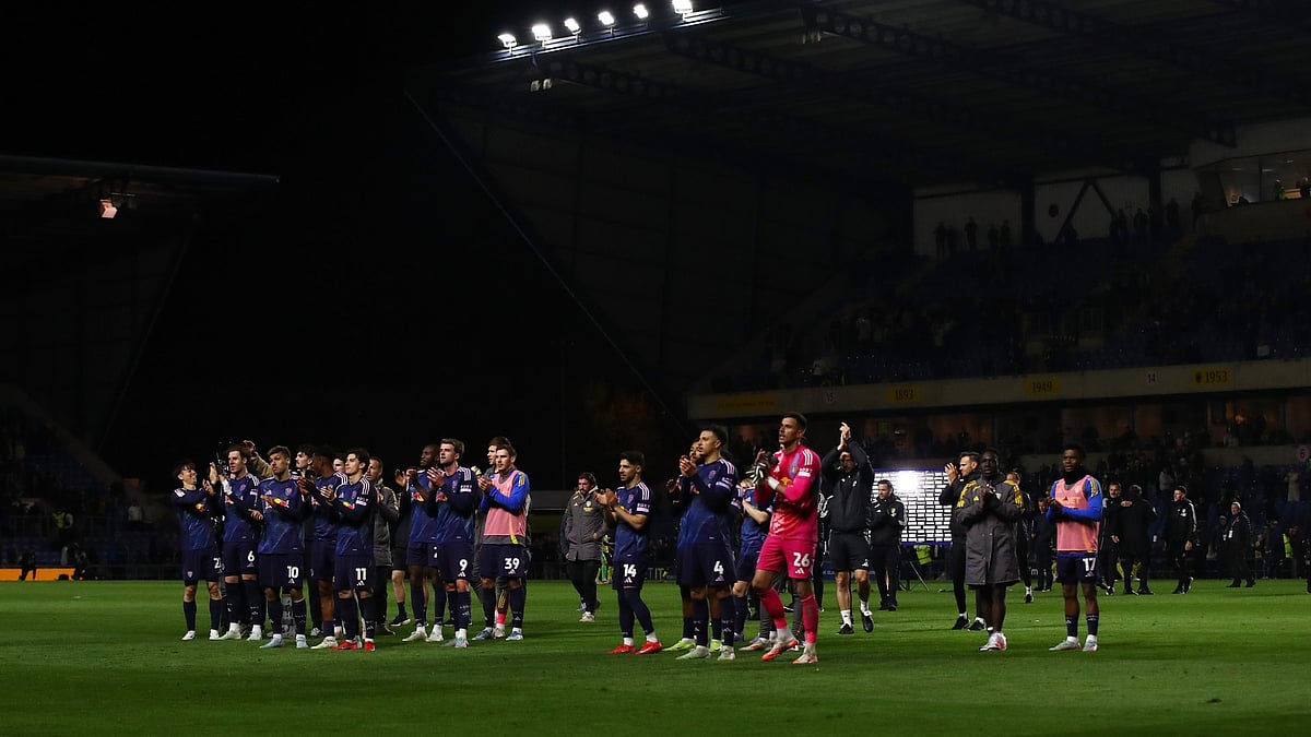 Leeds United players celebrate their win over Oxford United. - File