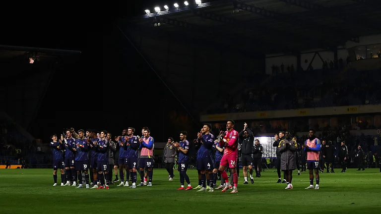 Leeds United players celebrate their win over Oxford United. - File