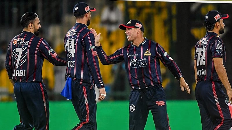 Karachi Kings celebrate a Quetta Gladiators wicket.
