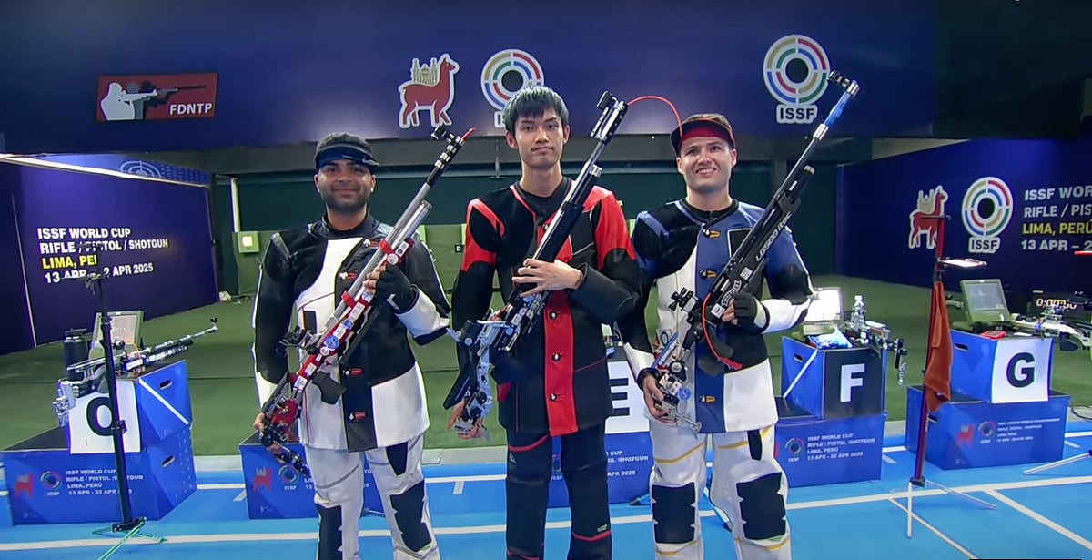 NRAI : Arjun Babuta (left), lost by just 0.1 points to reigning Olympic champion Sheng Lihao of China (middle).
