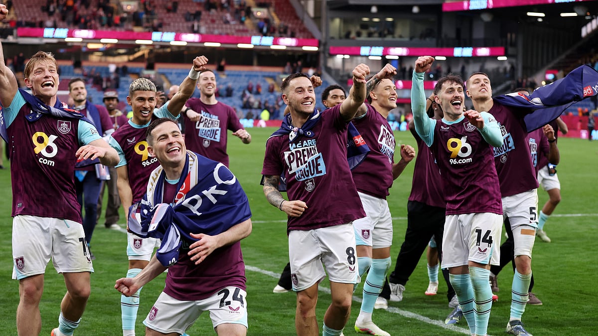 Burnley celebrate their promotion to the Premier League. - null