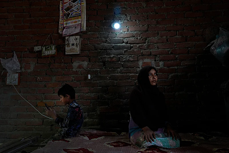 waqf act 2025: Shahina Fatima sits in her flat with her son in lucknow