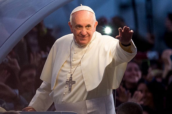 Pope Francis waves from the Popemobile