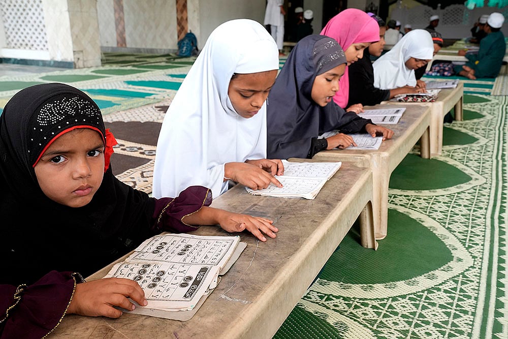waqf act 2025: Girls at Aishbagh madrassa in Lucknow