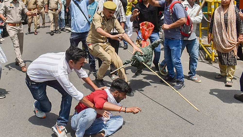 | Photo: PTI : Protest over Murshidabad violence