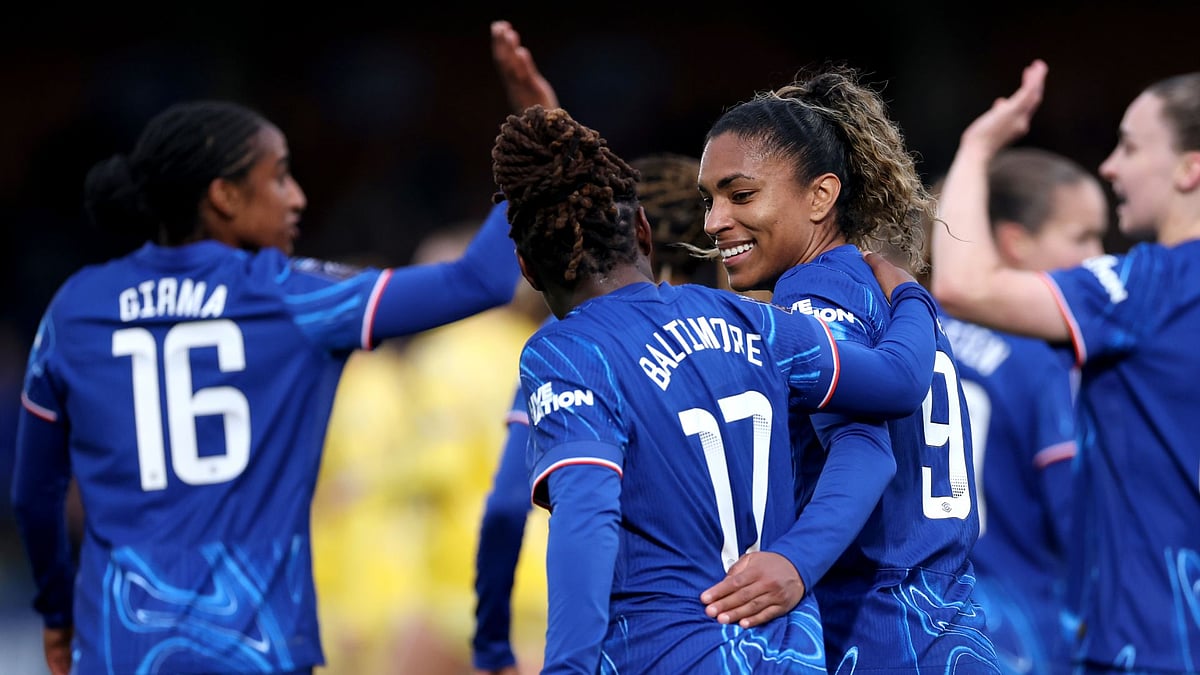 Chelsea celebrate Macario's first goal