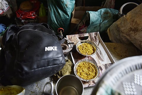Food and bags of tourists lie abandoned in the shacks of the tourist spot